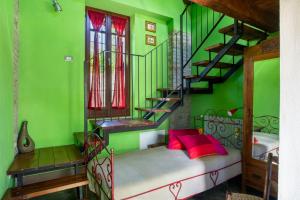 A bed or beds in a room at Cascina Sant'Eufemia