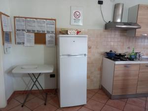Kuchyň nebo kuchyňský kout v ubytování 4 giugno Ferrara