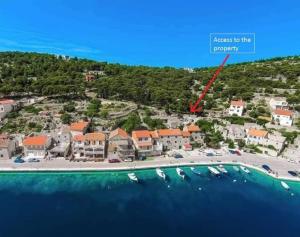 an aerial view of a villa on a beach at Holiday Lodge M3 in Žirje +29 photos