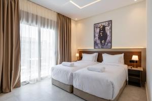 Krevet ili kreveti u jedinici u okviru objekta Hotel El Toro Tanger