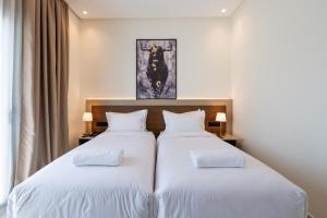 Voodi või voodid majutusasutuse Hotel El Toro Tanger toas