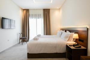 Krevet ili kreveti u jedinici u okviru objekta Hotel El Toro Tanger