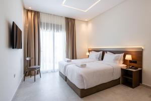 Krevet ili kreveti u jedinici u okviru objekta Hotel El Toro Tanger