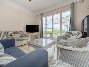 Et tv og/eller underholdning på Oasis Familiale près des Plages