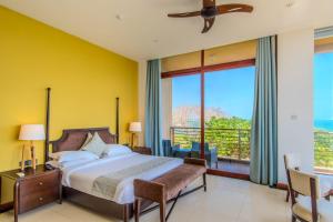 Letto o letti in una camera di Sooriya Resort & Spa
