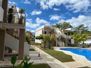 a view of a house with a swimming pool at EndlessSummer Beach Escape in Coco
