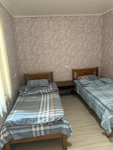 Katil atau katil-katil dalam bilik di Guest House Sevan 2