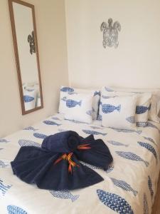 เตียงในห้องที่ Turtle's Nest Condo