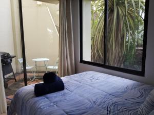 Krevet ili kreveti u jedinici u okviru objekta Turtle's Nest Condo +37 fotografija