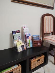 A seating area at La casa di Valentino - grazioso ed ampio bilocale
