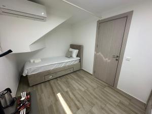 Voodi või voodid majutusasutuse Next Rooms toas