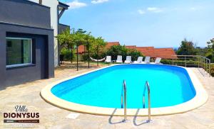 The swimming pool at or close to Arode Villa Dionysus