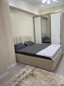 Postel nebo postele na pokoji v ubytování Ayni