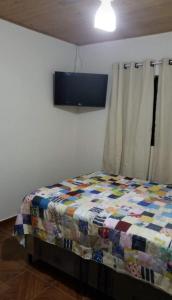 Postel nebo postele na pokoji v ubytování Casa com pisina infantil em Brotas
