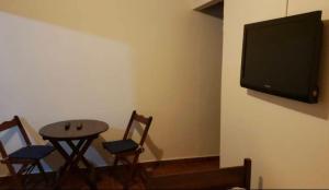 TV a/nebo společenská místnost v ubytování Casa com pisina infantil em Brotas
