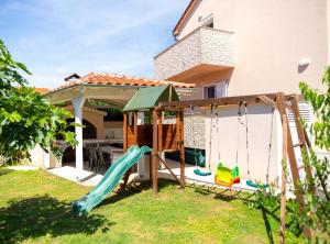 Κήπος έξω από το Apartmani Sabbioso