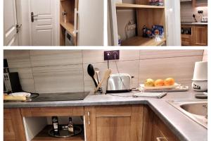 a kitchen with a sink and a counter with fruit on it at Loft proche CDG 6 pers, Parc Expo avec parking in Villeparisis +3 photos