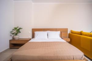 Postel nebo postele na pokoji v ubytování kyparissis first class