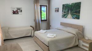 Postel nebo postele na pokoji v ubytování Valemare