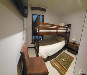 En eller flere senge i et værelse på Departamento Parque Pinares Pucón Playa Privada + 38 billeder