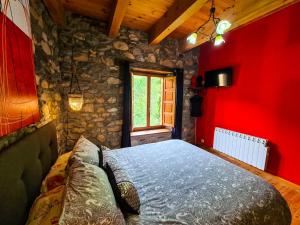 Postel nebo postele na pokoji v ubytování El Molino de la Ropería