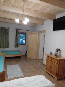 Posteľ alebo postele v izbe v ubytovaní Délibáb Apartman