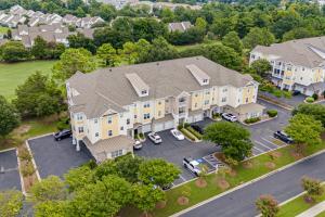 an aerial view of a large house with a parking lot at The Havens Barefoot Resort Unit 727 in North Myrtle Beach