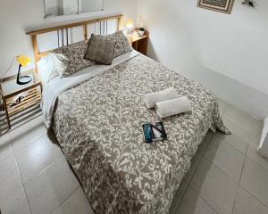 Postel nebo postele na pokoji v ubytování Alquiler de Habitación privada con las areas de sala, cocina y baño que se comparten cerca al Mar!