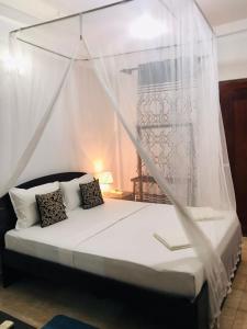Letto o letti in una camera di Kavee Transit Hotel