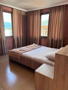 Postel nebo postele na pokoji v ubytování Guest House Rusalka