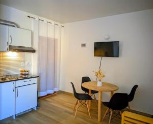 Η κουζίνα ή μικρή κουζίνα στο Odyssée Résidence