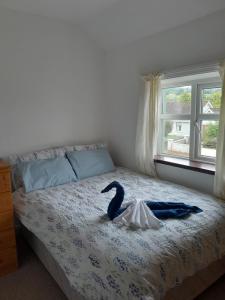 Ένα ή περισσότερα κρεβάτια σε δωμάτιο στο Mary's house