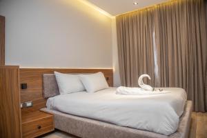 Letto o letti in una camera di Gaia Pyramids View INN