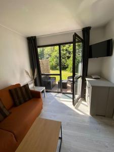 Posedenie v ubytovaní Joli T2 Résidence du Golf avec terrasse