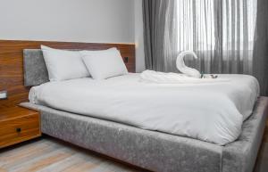 Letto o letti in una camera di Gaia Pyramids View INN