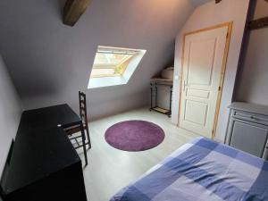 Postel nebo postele na pokoji v ubytování Maison de campagne en pierre à 15 min de Pau