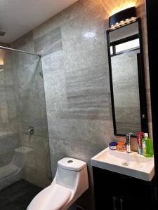 Ein Badezimmer in der Unterkunft Casa Cómoda