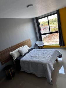 Postel nebo postele na pokoji v ubytování Casa Cómoda