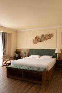 Voodi või voodid majutusasutuse Lumina Hotel Da Lat Central toas