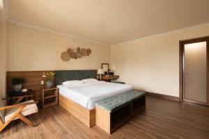 Voodi või voodid majutusasutuse Lumina Hotel Da Lat Central toas