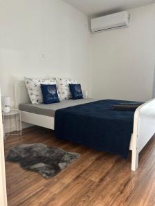 Ένα ή περισσότερα κρεβάτια σε δωμάτιο στο Gabriel III