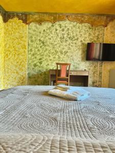 Letto o letti in una camera di Hotel De La Gare