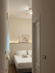 Apartamento en el centro histórico房間的床