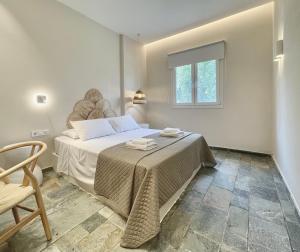 Posteľ alebo postele v izbe v ubytovaní StayBridge Apartments, Mesongi