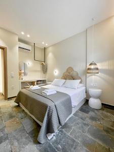Posteľ alebo postele v izbe v ubytovaní StayBridge Apartments, Mesongi