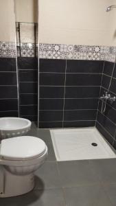 Koupelna v ubytování Hotel Al Andalous