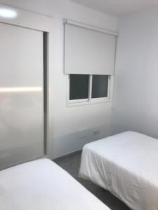 A bed or beds in a room at Bahia Colon