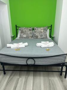 En eller flere senge i et værelse på La Maddalena House