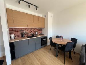 Η κουζίνα ή μικρή κουζίνα στο Apartament MARIA