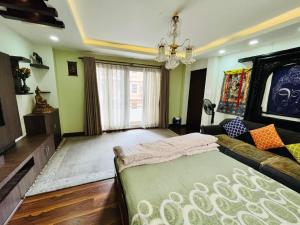 Tempat tidur dalam kamar di SiddhiNiwas